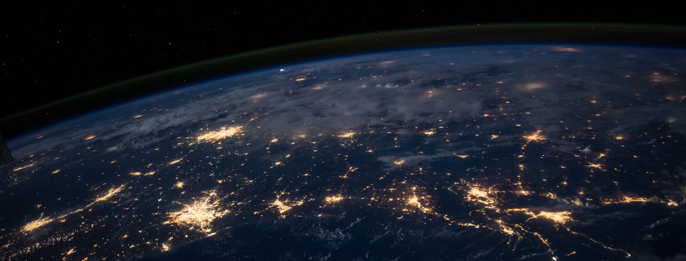 Global digital network representing IT and OT cybersecurity connectivity